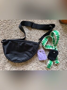 Black Crescent Crossbody Bag with Green Striped Strap